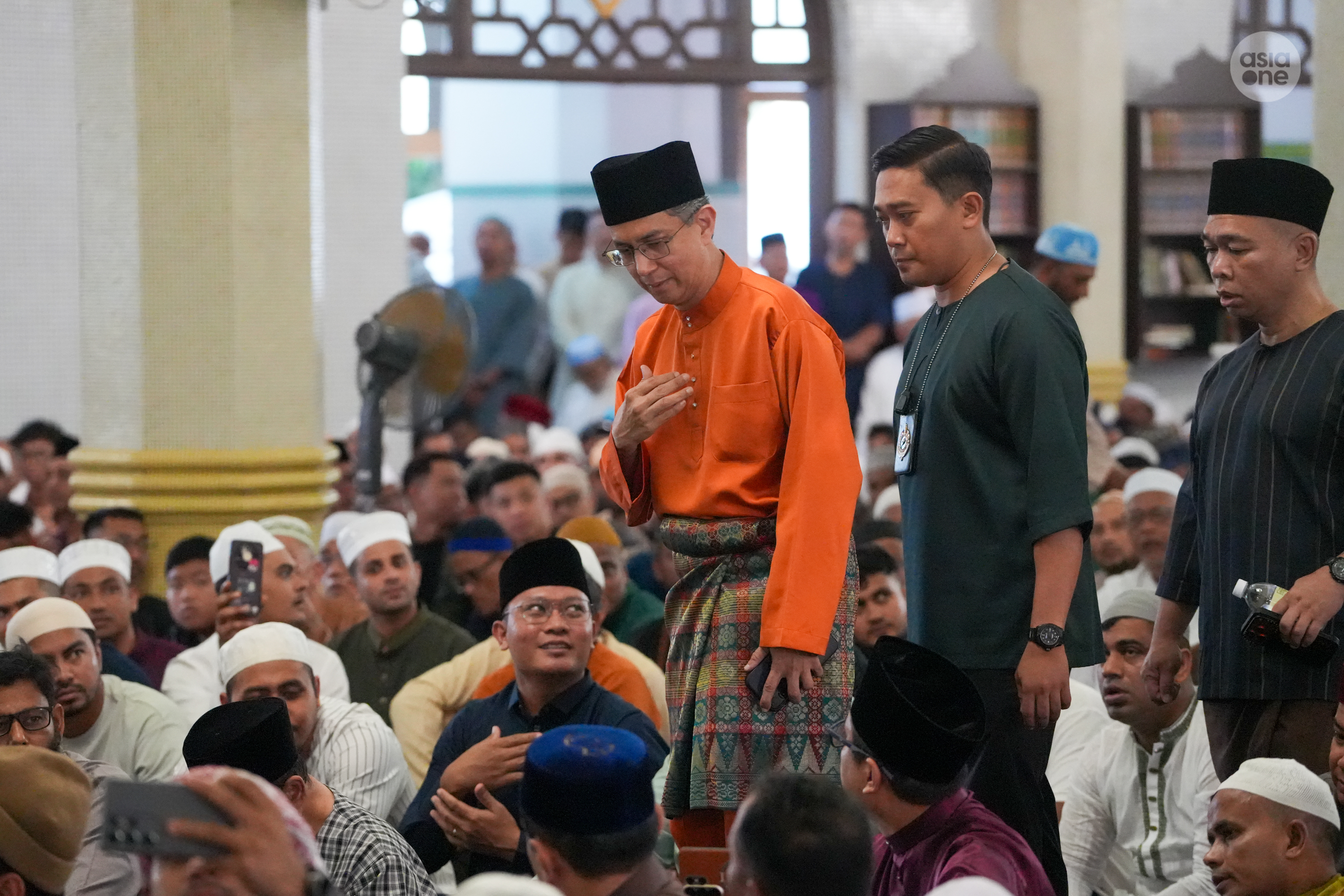Acting Minister-in-charge of Muslim Affairs Assoc Prof Faishal Ibrahim joining the Muslim community for Hari Raya Aidilfitri prayers at Sultan mosque on Saturday (March 21) morning.