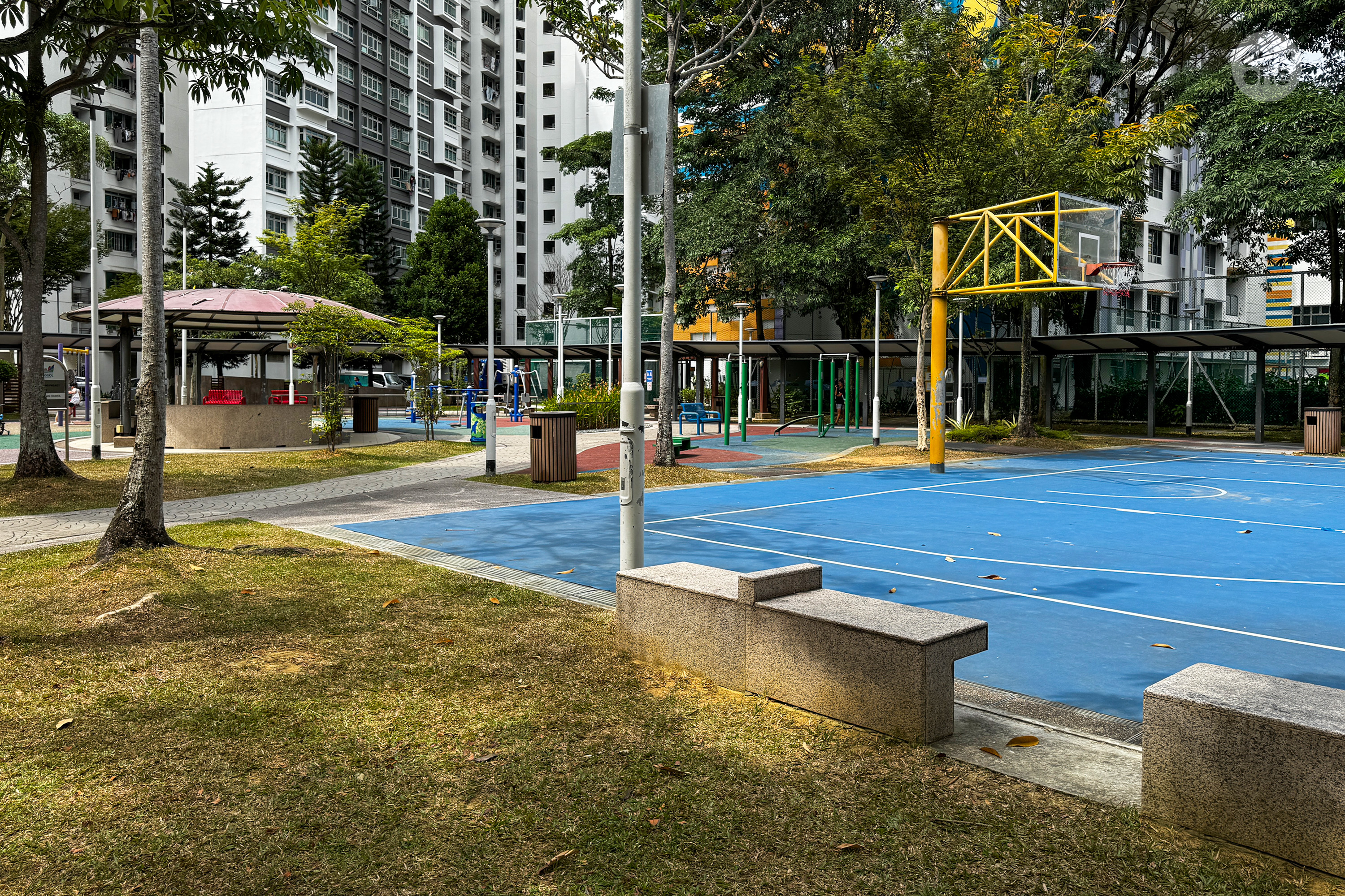 View of the playground and basketball court between Block 305A and 301A.