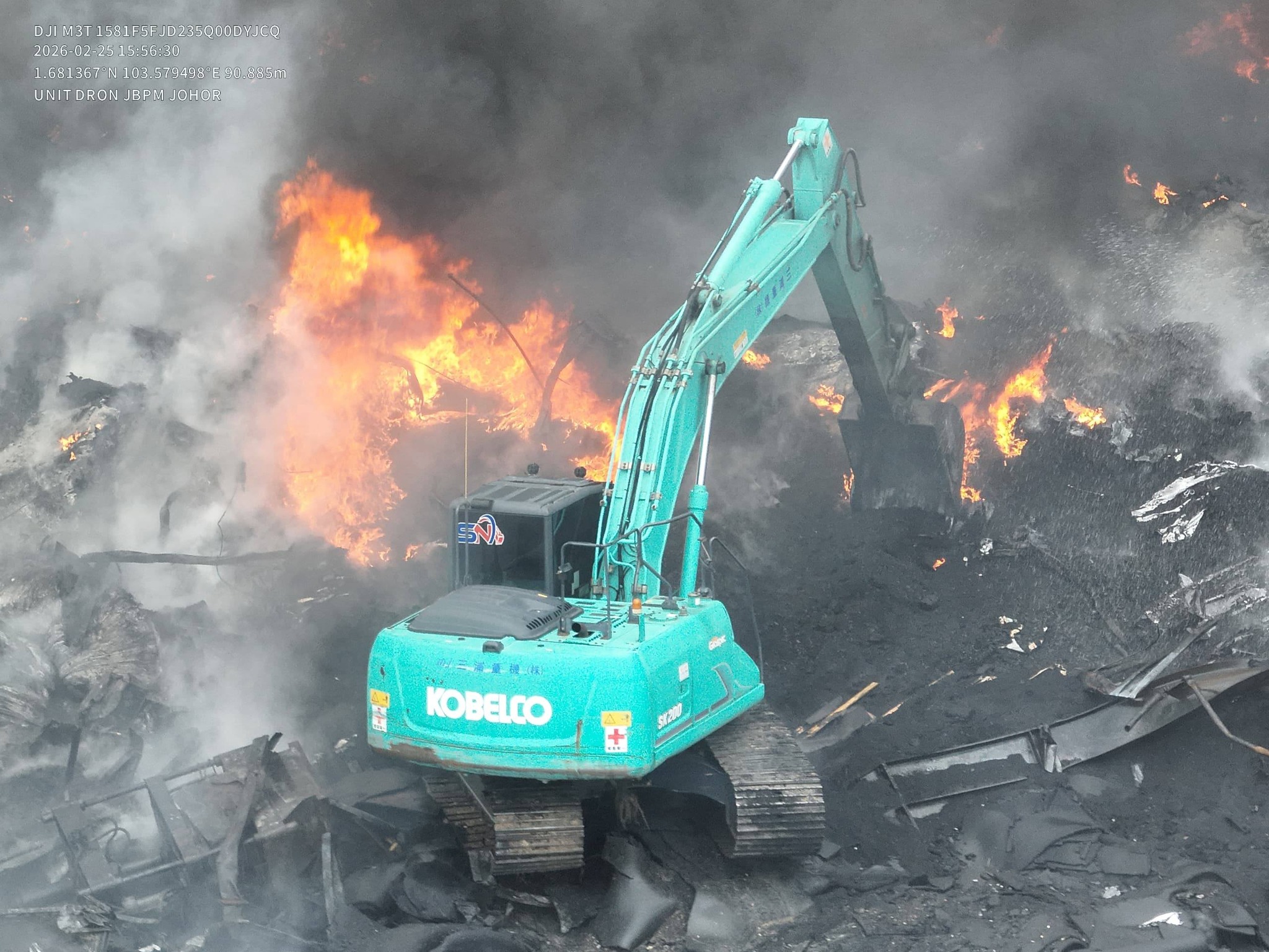 Heavy machinery such as excavators and bulldozers have been brought in to clear flammable waste materials.