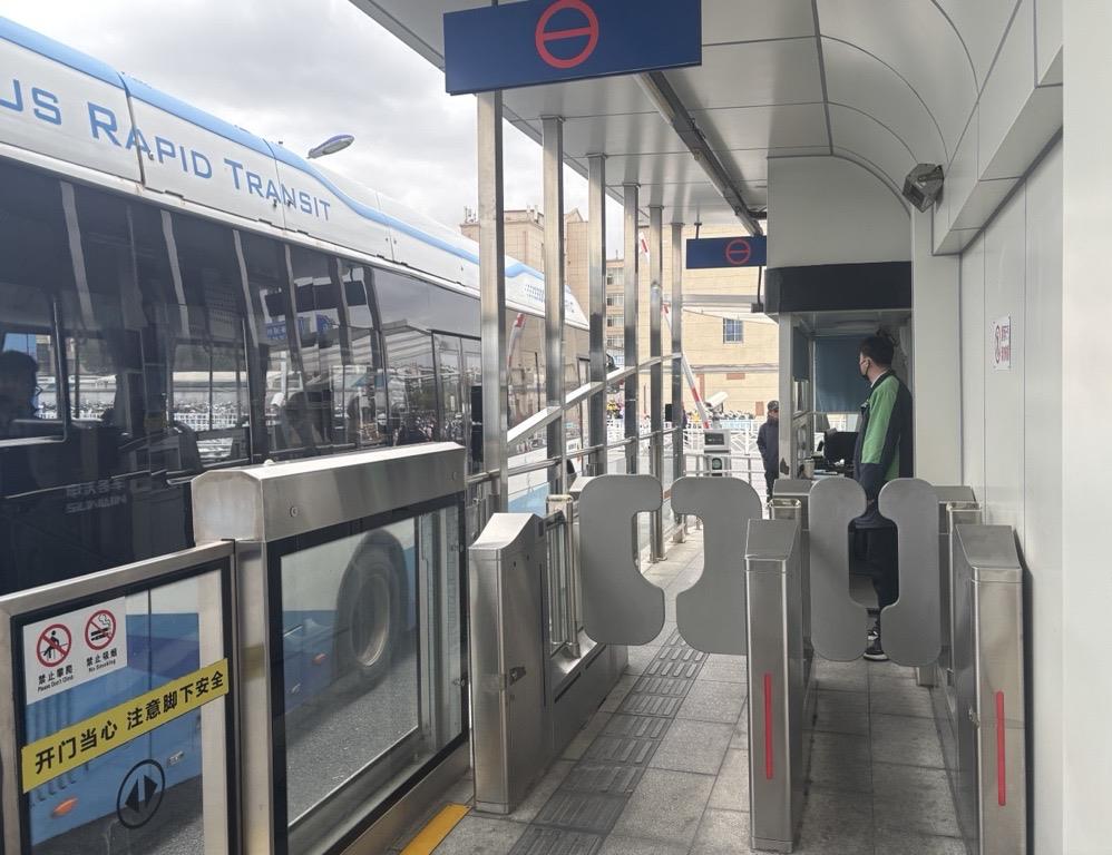Fare payment at stations and platform-level boarding in Shanghai.