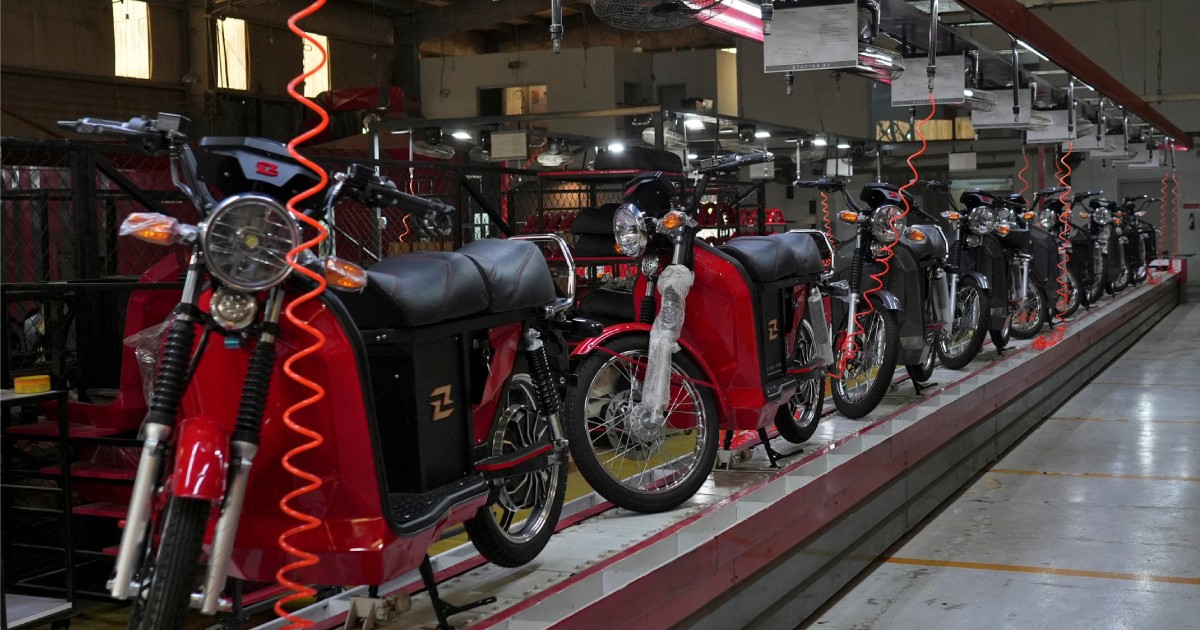 Soaring costs, fuel shortage fears drive Pakistan to electric motorbikes