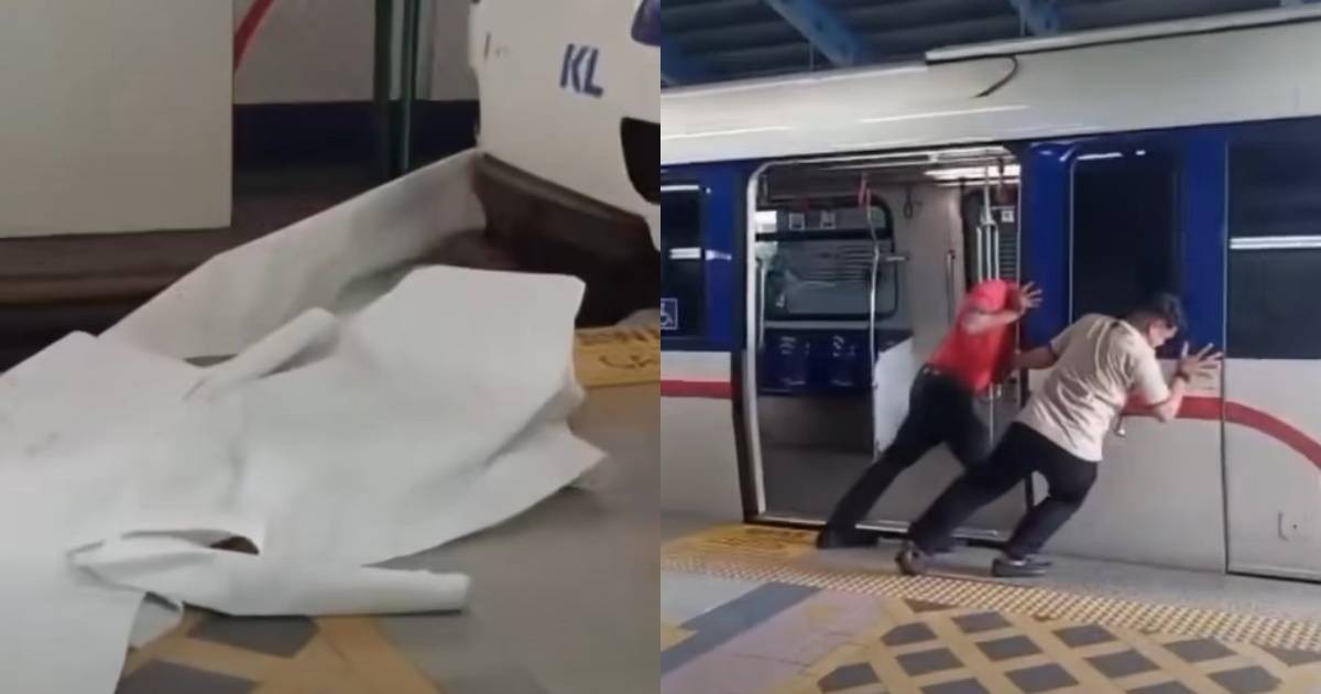 LRT train in Kuala Lumpur gets stuck on banner which fell on tracks