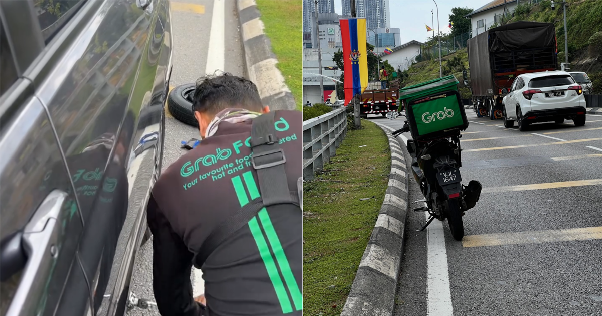 'A true angel': GrabFood delivery rider in KL disregards order delay, changes tyre for woman to prevent jam
