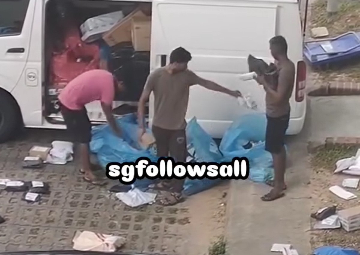 'This is the quality we get': Deliverymen gets called out for throwing parcels at carpark
