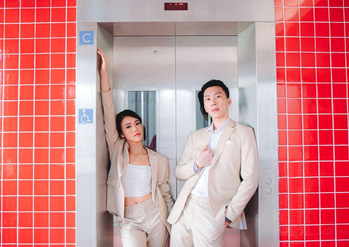 Red (lift) wedding? Couple pose for their photo shoot at viral red HDB block